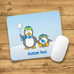 Snowballing penguins mouse pad