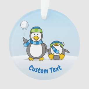 Snowballing penguins ornament