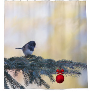 Snowbird visiting an evergreen with a red ornament shower curtain