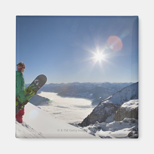 Snowboarder looking from mountain top magnet (Front)