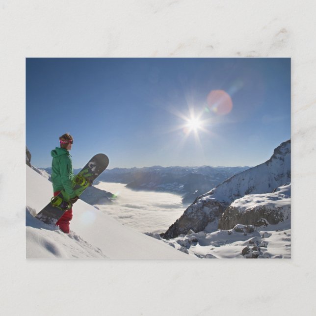 Snowboarder looking from mountain top postcard (Front)