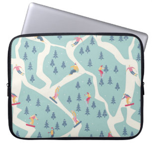 Snowboarders and skiers ride in the ski resort. Pe Laptop Sleeve