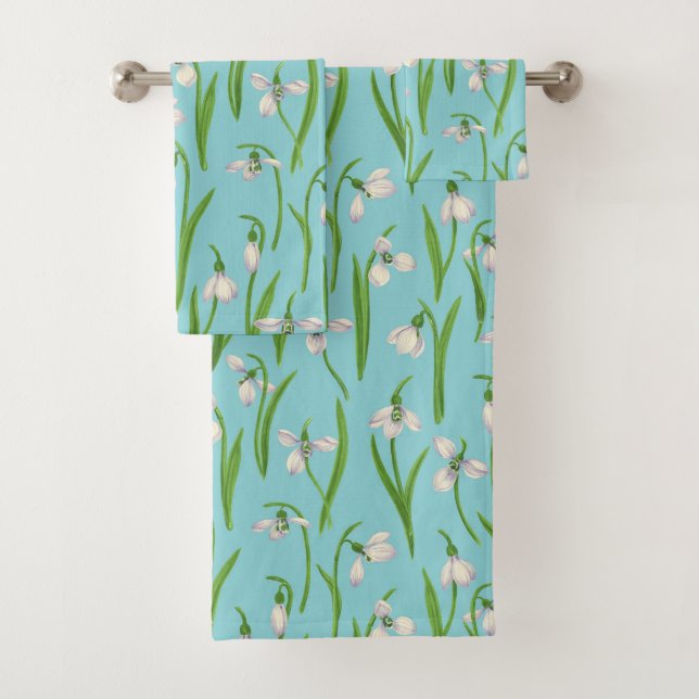 Snowdrops on pool blue bath towel set (Insitu)
