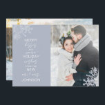 Snowflake Merry Kisses Warm Wishes 2 Photo Holiday Card<br><div class="desc">Celebrate your first holiday season as newlyweds with our elegant Snowflake Merry Kisses Warm Wishes 2 Photo Holiday Card Christmas card. Featuring a stunning wedding photo accented by delicate icy blue snowflakes, this card reads "merry kisses and warm holiday wishes from the new mr and mrs, " and is personalised...</div>