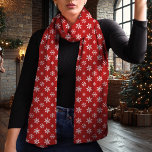 Snowflake Red and White Christmas Scarf<br><div class="desc">Embrace the winter season with this elegant red and white Christmas scarf featuring a delicate snowflake pattern. The timeless red background and contrasting white snowflakes create a chic and versatile look that complements any holiday outfit. Made from lightweight chiffon, this scarf adds a touch of sophistication to your winter wardrobe...</div>