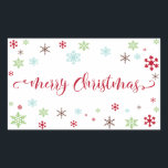 Snowflake Whimsy Merry Christmas Red Typography Rectangular Sticker<br><div class="desc">Send your Christmas greetings with style! Using a fresh, modern palette with a retro vibe, this whimsical design was created for those who enjoy trends but appreciate a unique flavour. The words "Merry Christmas" are rendered in a swirling calligraphy font, in a cheerful bright red. Around the words are snowflakes...</div>