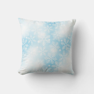 Snowflakes and lights on blue cushion