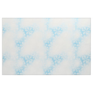 Snowflakes and lights on blue fabric