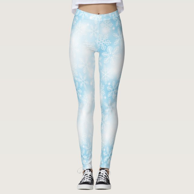 Snowflakes and lights on blue leggings (Front)