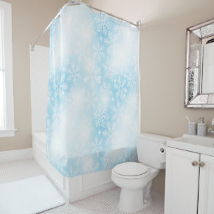Snowflakes and lights on blue shower curtain