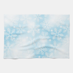 Snowflakes and lights on blue tea towel