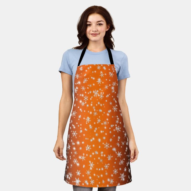 Snowflakes and Sparkles over Orange Apron (Worn)
