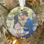 Snowflakes First Christmas As Married Last Name Ornament<br><div class="desc">Snowflake themed first Christmas as married ornament with your last name in a charming brush script, personalised with your wedding photos. First Christmas as married ornament for newly weds personalised with one photo on either side, your last name in a white brush script overlay along with lots of pretty snowflakes....</div>