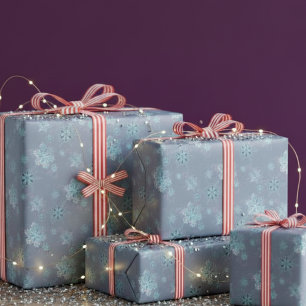 snowflakes in dusty blue wrapping paper