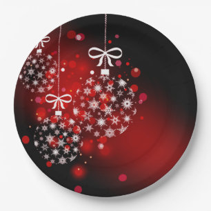 Snowflakes on a red and black background. paper plate