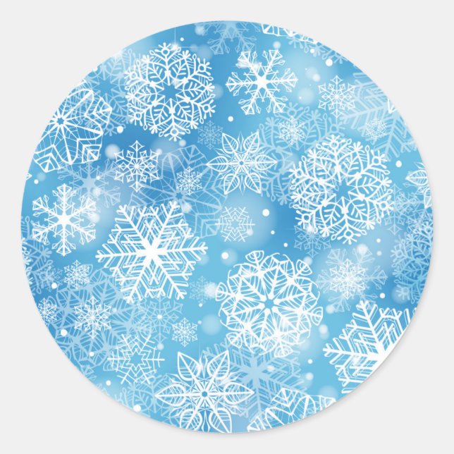 Snowflakes on blue classic round sticker (Front)