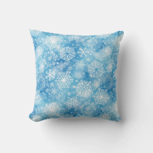 Snowflakes on blue cushion