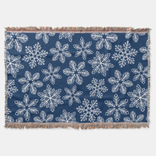 Snowflakes on dark blue throw blanket