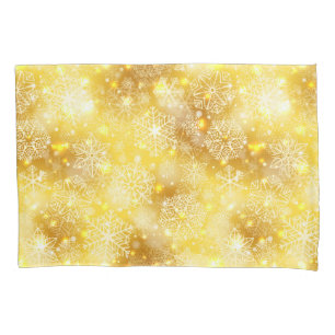 Snowflakes on golden pillowcase