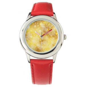 Snowflakes on golden watch