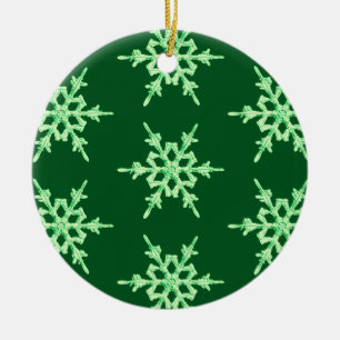 Snowflakes, pale green crystals on dark green ceramic tree decoration