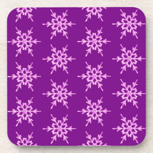 Snowflakes, pale orchid crystals on purple coaster