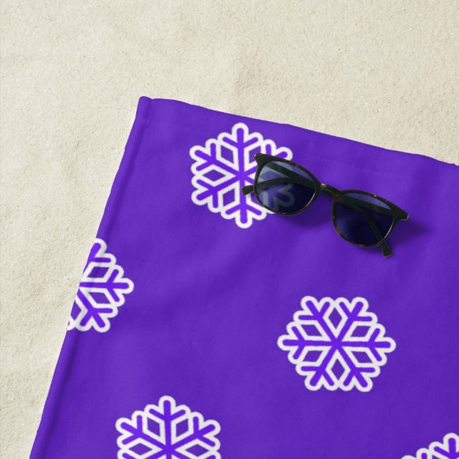Snowflakes pattern on blue beach towel (In Situ)