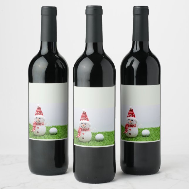 Snowman and golf ball on green grass Christmas Wine Label (Bottles)