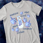 Snowman Dreidels Funny 8 Crazy Nights Hanukkah<br><div class="desc">Personalise this funny Hanukkah T-Shirt as a cute gift or maybe for yourself! A happy Jewish snowman waves hello in the centre of the design with seven matching blue and purple dreidels of varying sizes dance around him. Sprinkled in among the dreidels are words in a dark blue whimsical handwritten...</div>