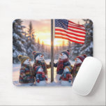 Snowman Family Gathering Around a Flagpole Mouse Mat<br><div class="desc">A family of snowmen stands proudly in front of a tall flagpole,  with the American flag gently waving against a backdrop of snow-covered trees,  as the sun casts a warm glow over the scene</div>