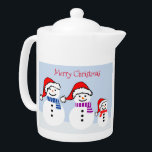 Snowman Family Merry Christmas Teapot<br><div class="desc">This teapot is perfect for the Christmas holidays.  It shows a snowman family with a mama,  papa,  and child.  With big smiles,  red Santa hats,  and warm colourful scarves around their necks,  this adorable snowman family teapot is a perfect way to add cheer to your holiday.</div>