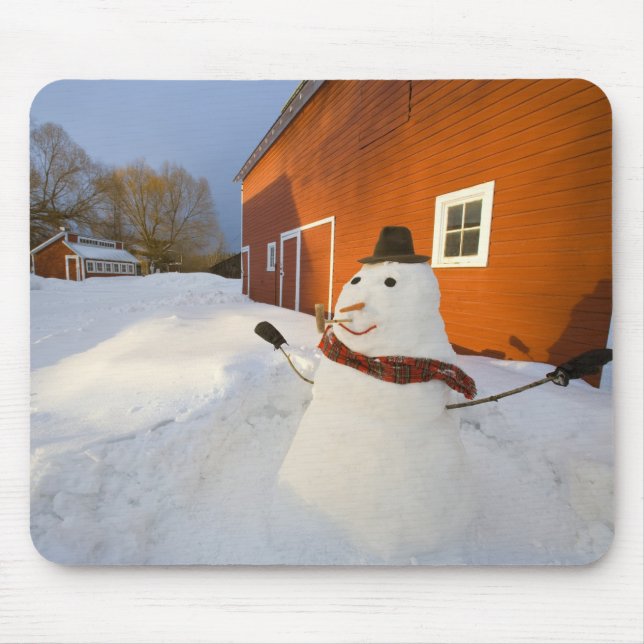 Snowman in front of red barn in Columbia Falls Mouse Mat (Front)