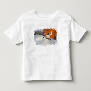 Snowman in front of red barn in Columbia Falls Toddler T-Shirt
