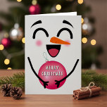 Snowman Merry Christmas Cute Smiling Face Winter Card<br><div class="desc">Get in the Christmas spirit with this cute smiling snowman X-mas card.  Designed with a snowman with rosy cheeks and cheerful smile holding an ornament,  this card is sure to bring joy to family and friends alike.  Personalise it for a unique holiday gift everyone will love.</div>
