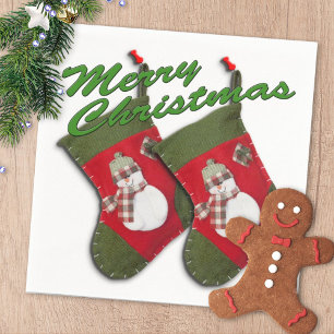 Snowman on Christmas Stocking Over White Napkin