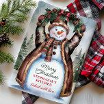 Snowman Rustic Merry Christmas Tea Towel<br><div class="desc">Celebrate the warmth of the holiday season with this charming snowman kitchen towel. Featuring a festive snowman raising a joyful wreath against a snowy forest backdrop, this towel adds a cosy Christmas touch to any kitchen. Personalise it to make it a special addition to your holiday decor or a thoughtful...</div>