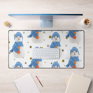 Snowman with blue hat and scarf desk mat