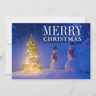 Snowmen Standing Next To Christmas Tree Holiday Card