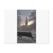 Snowy Clock Tower with Bench