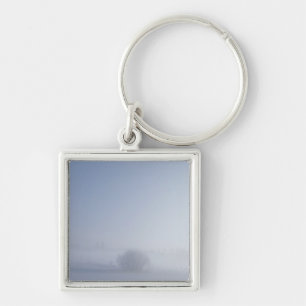 Snowy cold winter landscape key ring