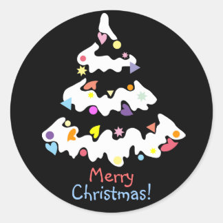 snowy decorated Christmas tree Classic Round Sticker