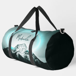 Snowy mountain mysterious blue neon light monogram duffle bag