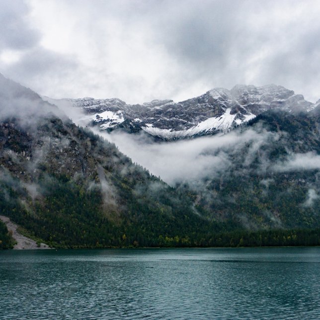 Snowy mountains in the fog at Plansee lake   Shower Curtain (Creator Uploaded)