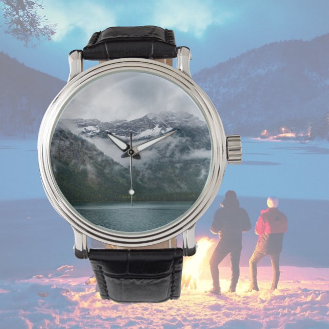 Snowy mountains in the fog at Plansee lake   Watch (Creator Uploaded)