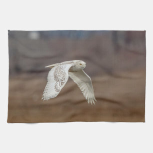 Snowy owl in flight tea towel