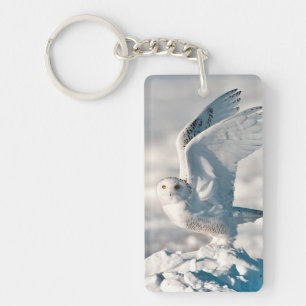 Snowy Owl taking off from snow Key Ring