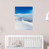 Snowy winter mountain wrapped in clouds