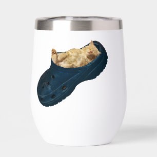 "Snug as a Bug: The Kitten's Croc Nap"
