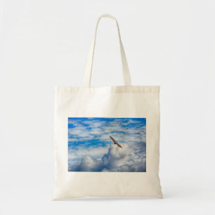 Soaring Eagle flying above the clouds, Alaska, USA Tote Bag