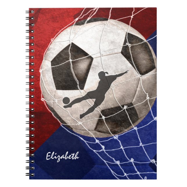 Soccer ball denting the net red blue girl's soccer notebook (Front)